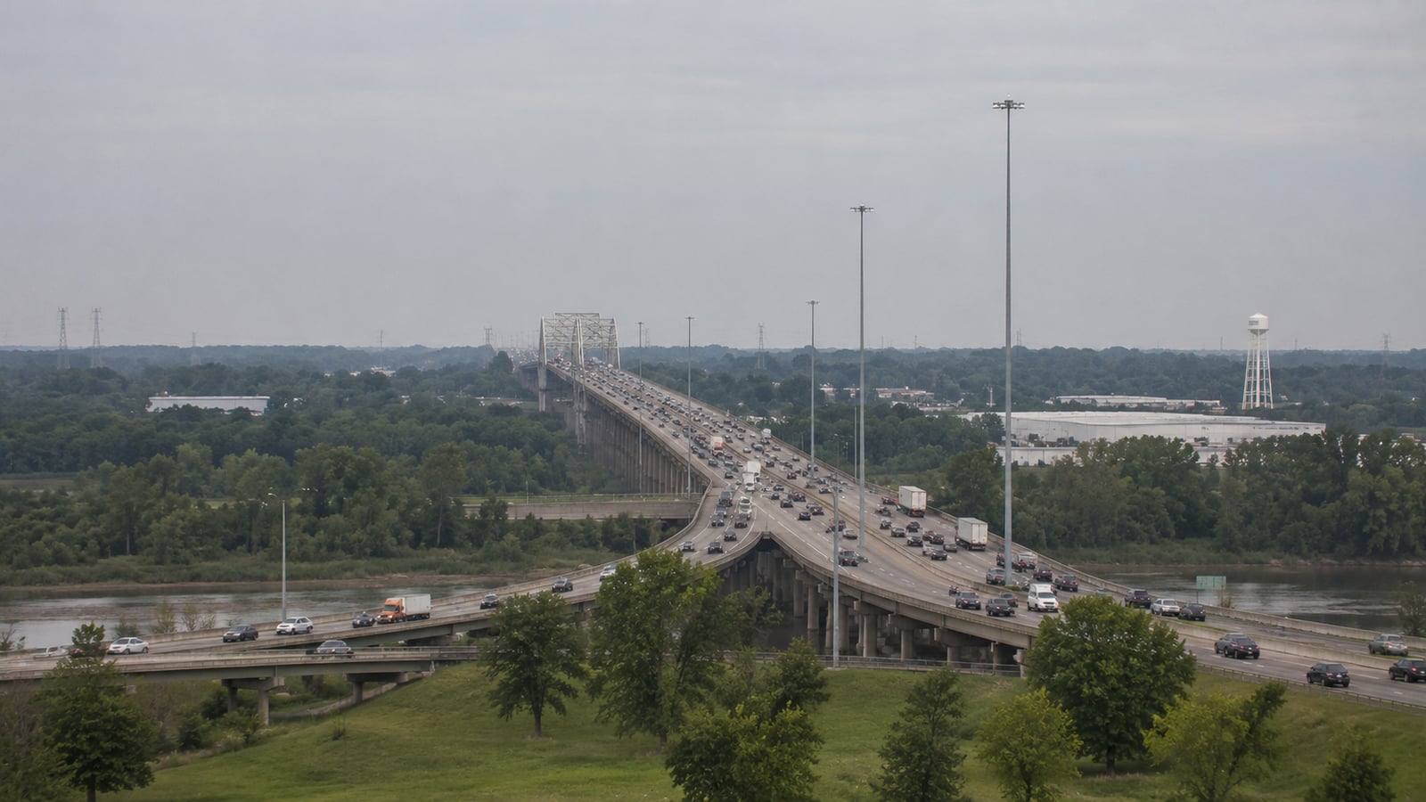 View of the I-55 corridor crossing the Tennessee-Mississippi state line with northbound commuter traffic heading toward Memphis