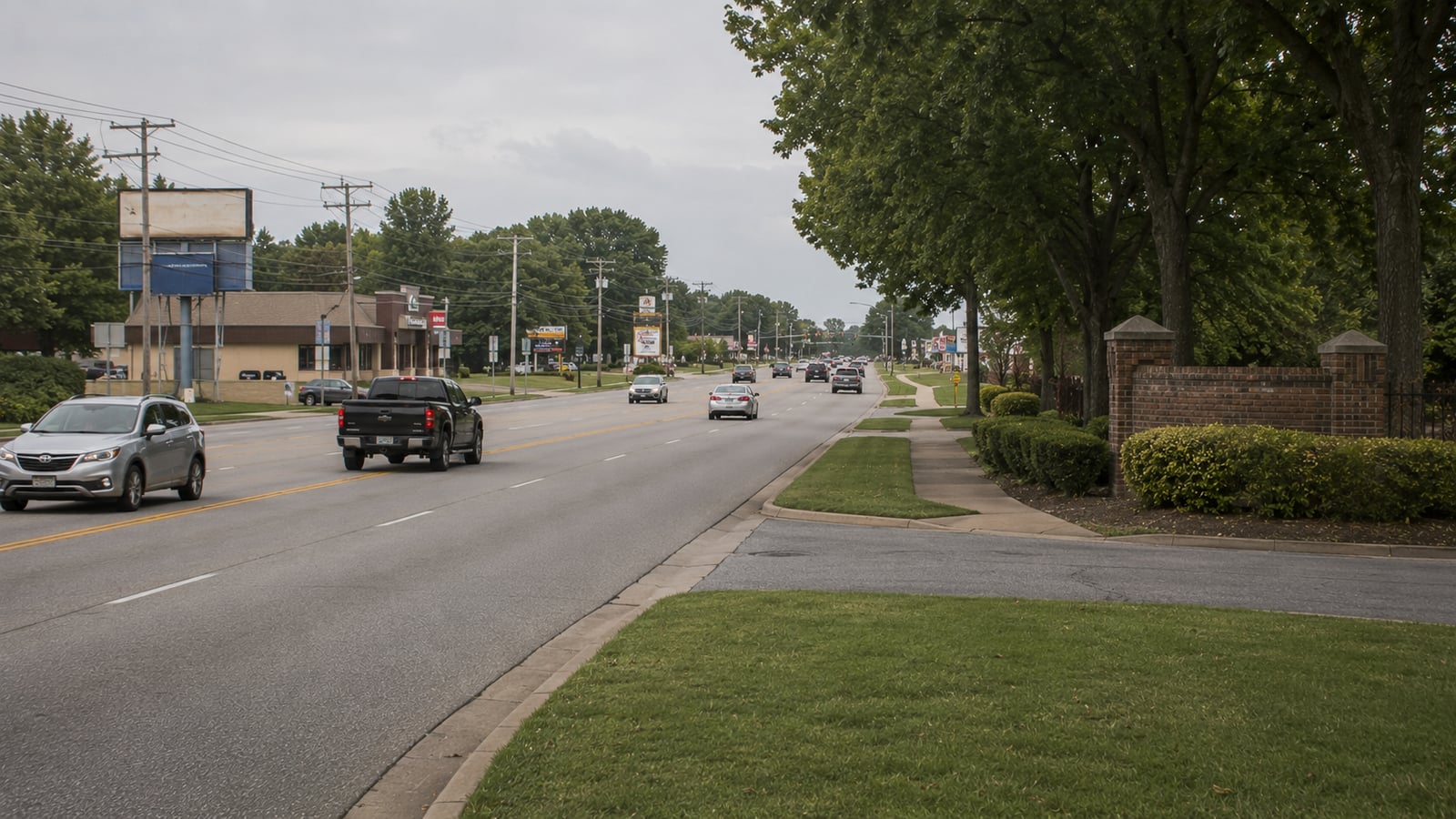 Stage Road corridor in Bartlett Tennessee showing established commercial and residential character with mature tree canopy