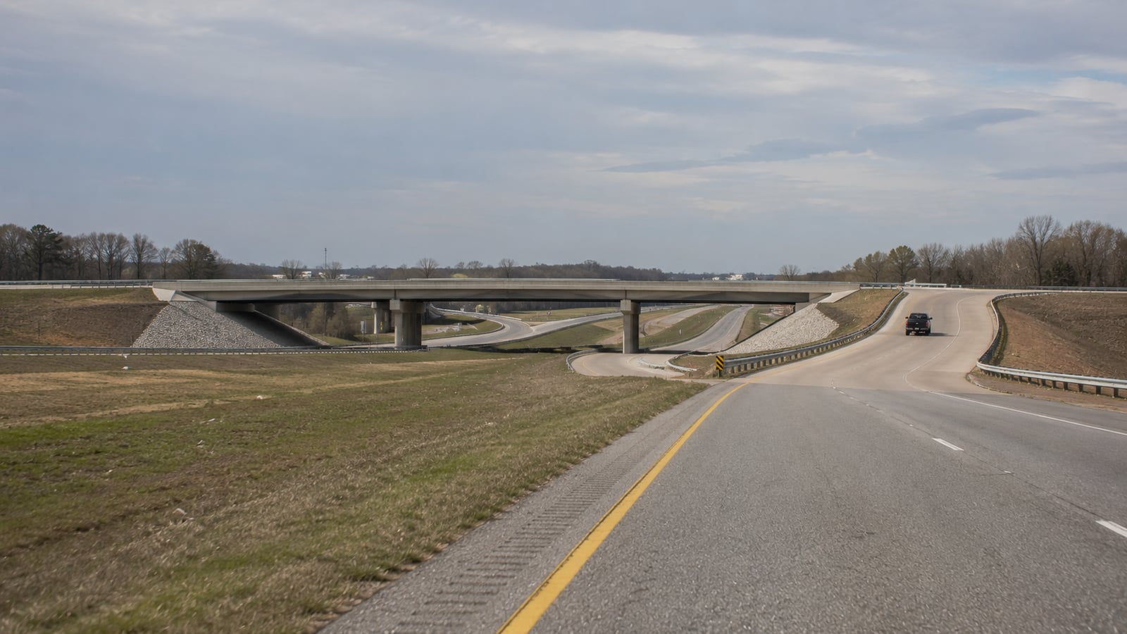 I-269 interchange overpass near Hernando Mississippi with flat north Mississippi landscape and empty ramp in morning light