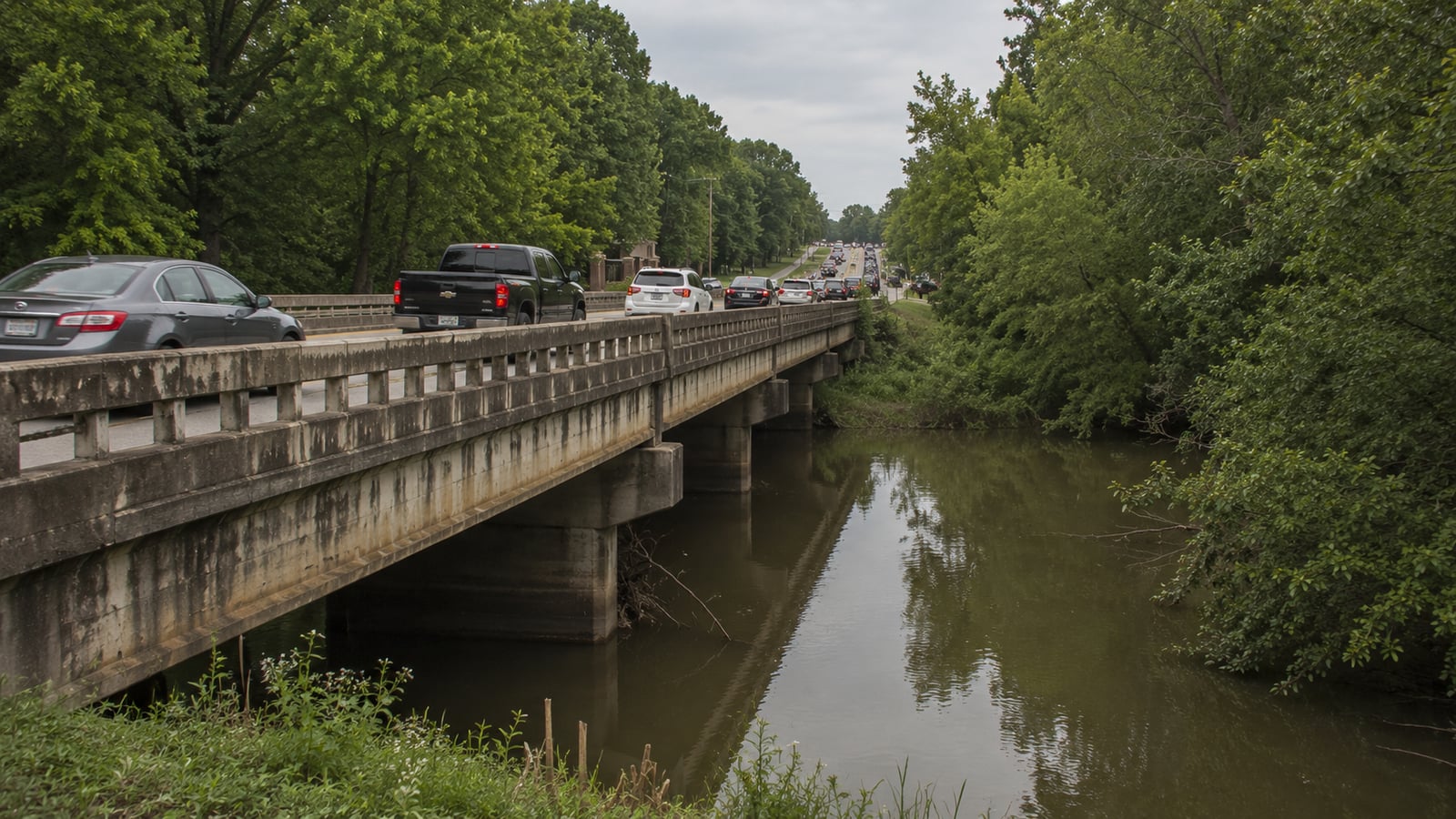 Wolf River bridge crossing in Germantown Tennessee with backed-up traffic on the approach road